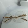 Cartier-Frameless-Round-Face-Glasses-CA319-3-rotated-1.jpg