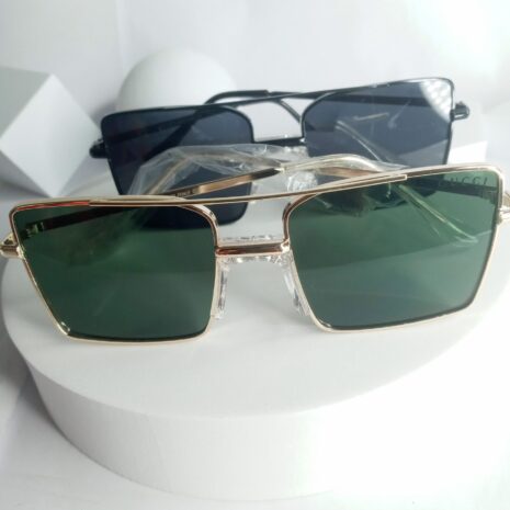 Gucci-4-conner-Glasses-GU322-4.jpg