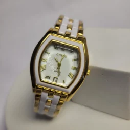 guess gold womens watch roman numerals date display 01 - Guess Women's 9913 Quartz Gold-Tone White Water Resistant Watch