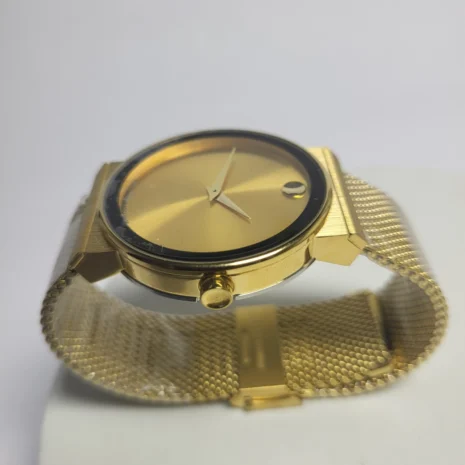 movado-swiss-luxury-watch-gold-sunburst-dial-mesh-bracelet-04.webp
