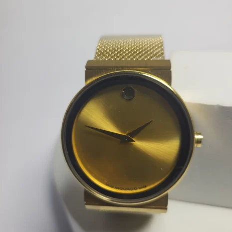 movado-swiss-luxury-watch-gold-sunburst-dial-mesh-bracelet-05.webp