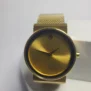 movado-swiss-luxury-watch-gold-sunburst-dial-mesh-bracelet-05.webp