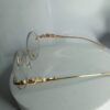 Cartier Frameless Round Glasses with Gold Panther Embellishment