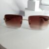 Cartier CA317 Rimless Rectangular Brown Gradient Sunglasses with Gold Accents