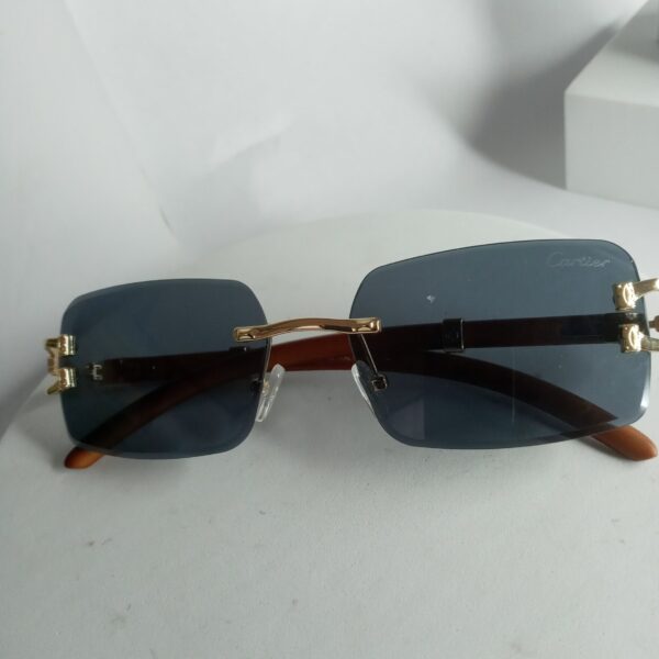 Cartier Luxury Rimless Wooden Temple Sunglasses with Gold Accents