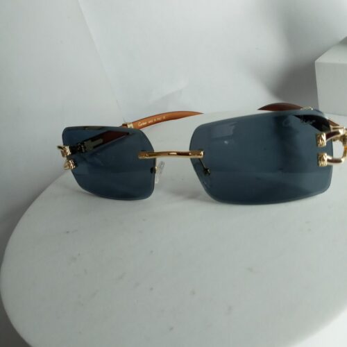 Cartier Luxury Rimless Wooden Temple Sunglasses with Gold Accents
