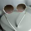 Chanel Women's Oversized Hexagonal Gold Frame Sunglasses with White Accent