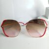 Chanel Women's Oversized Hexagonal Gold Frame Sunglasses with White Accent