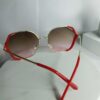 Chanel Women's Oversized Hexagonal Gold Frame Sunglasses with White Accent