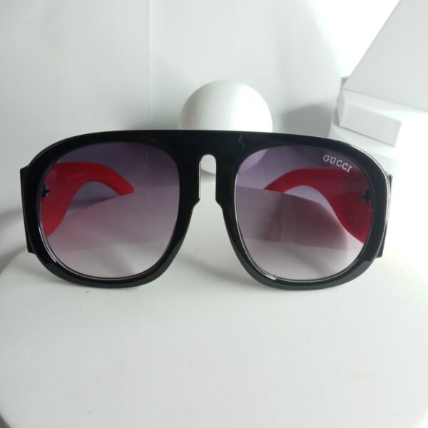 Gucci Black Frame Red Arm Shield Sunglasses with Purple Gradient Lenses