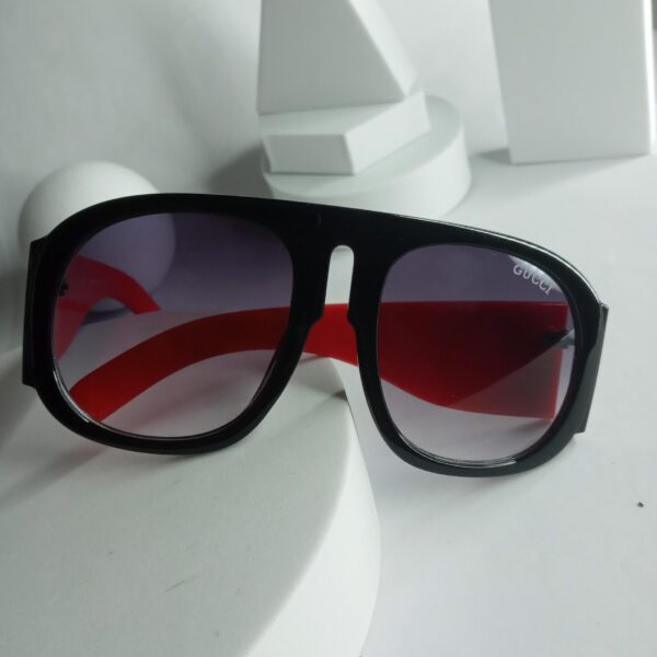 Gucci Black Frame Red Arm Shield Sunglasses with Purple Gradient Lenses
