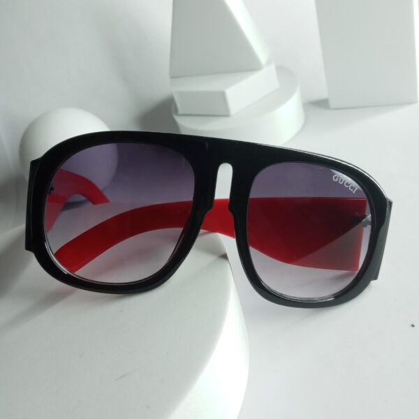 Gucci Black Frame Red Arm Shield Sunglasses with Purple Gradient Lenses