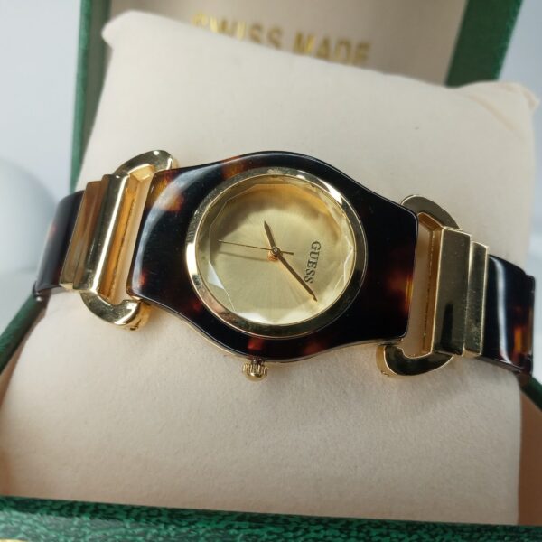 Guess Women's Gold Tone Faceted Crystal Tortoise Shell Analog Watch