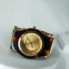 Guess Women's Gold Tone Faceted Crystal Tortoise Shell Analog Watch