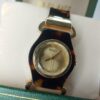Guess Women's Gold Tone Faceted Crystal Tortoise Shell Analog Watch