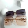 Versace Rimless Rectangle Tinted Sunglasses