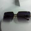 Versace Rimless Rectangle Tinted Sunglasses