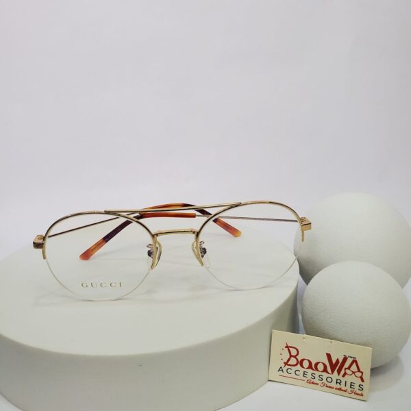 Gucci GG056820 Gold-Tone Metal Oval Blue Tinted Unisex Glasses