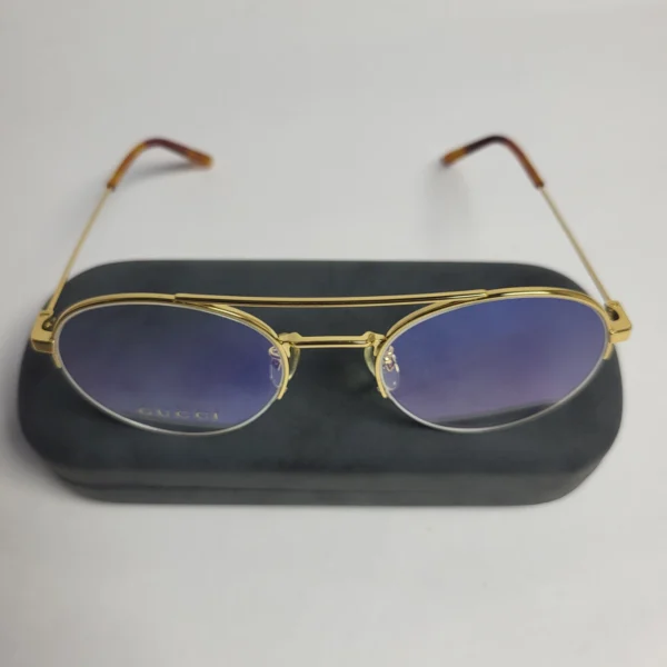 Gucci GG056820 Gold-Tone Metal Oval Blue Tinted Unisex Glasses
