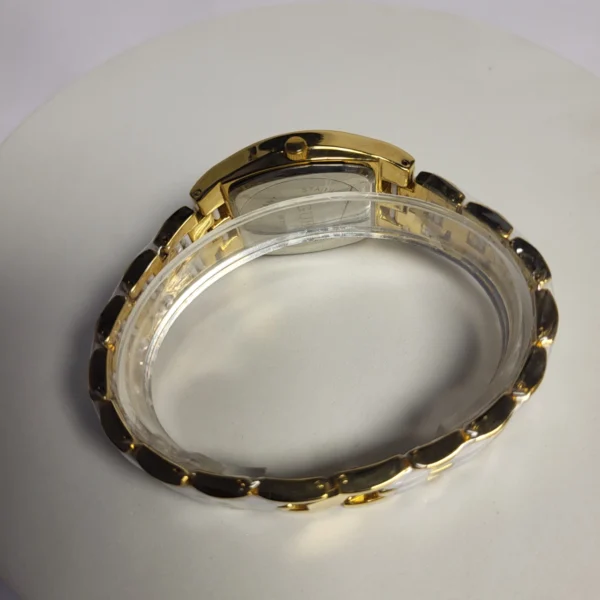 Guess Women's 9913 Quartz Gold-Tone White Water Resistant Watch