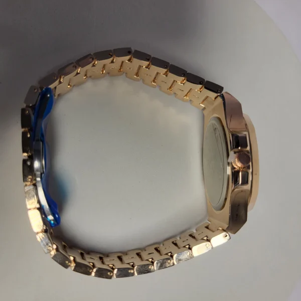 Patek Philippe 1560 Men's Gold Textured Stainless Steel Water Resistant Watch