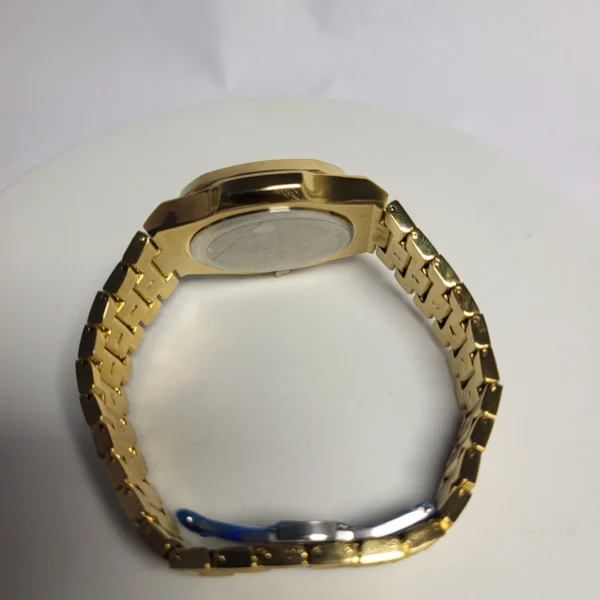 Patek Philippe 1560 Men's Gold Textured Stainless Steel Water Resistant Watch